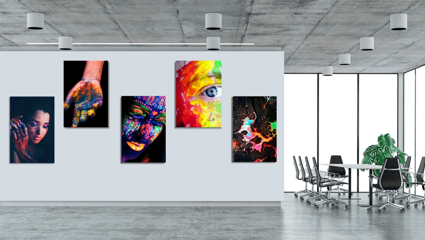 Colorful abstract aluminum photo prints featuring neon paint portraits displayed in a modern office gallery wall, showcasing personalized metal pictures, panoramic metal prints, and professional aluminum metal photo prints from Aluminyze.
